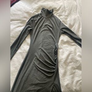 Super cute grey midi dress with ruching on side and slit up one leg.